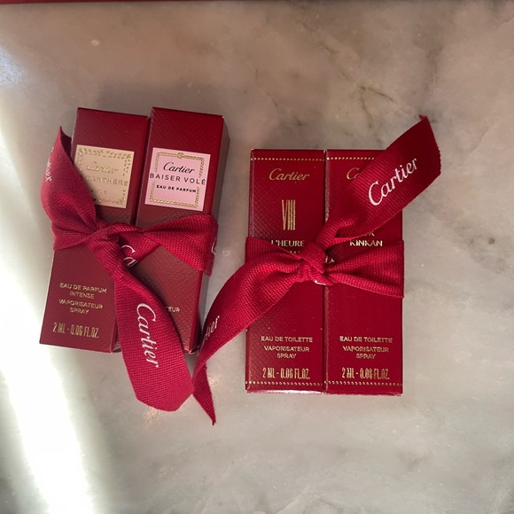 Four brand new Cartier perfume samples plus a Cartier shopping bag. - Picture 3 of 6